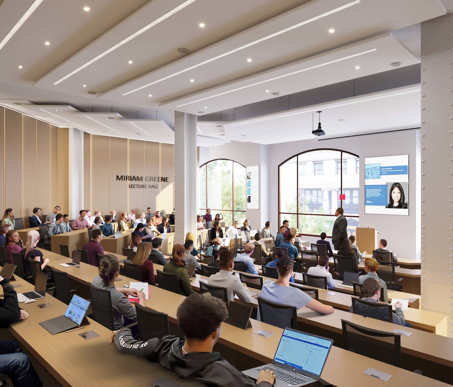 Two students play a piano in one of the common areas